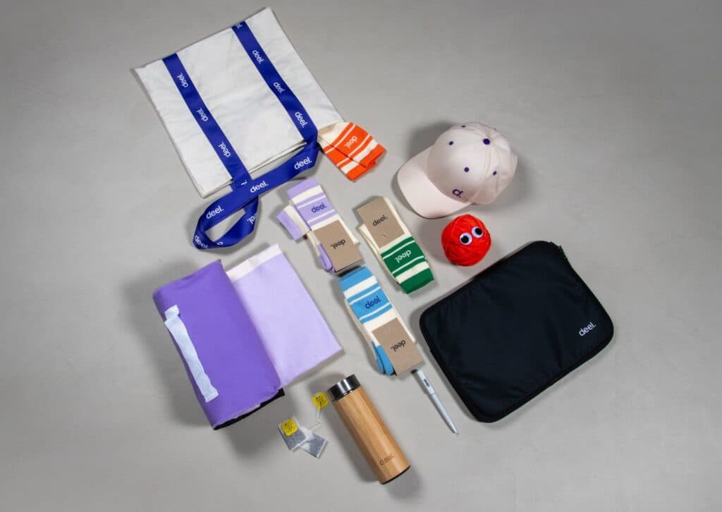 Deel branded merchandise flatlay